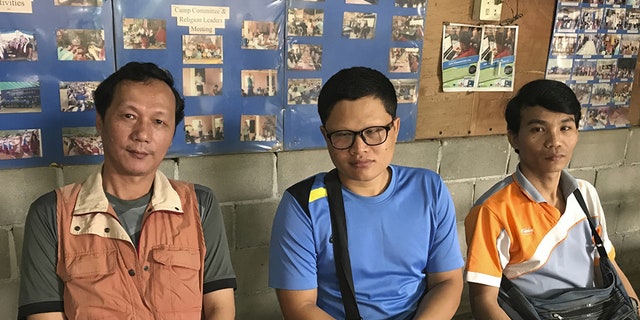 Honest (left) with other leaders of the Mae La camp lament the sharp reductions in funding that have occurred in recent years.