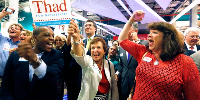 June 24, 2014: Supporters of Sen. Thad Cochran, R-Miss., break into cheer as he is declared the winner in his primary runoff for the GOP nomination for U.S. Senate at his victory party at the Mississippi Children's Museum in Jackson, Miss.