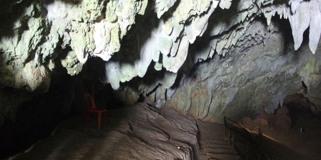 In this photo taken Saturday, June 23, 2018, stalactites hang at the entrance to a large cave where a group of boys went missing in Chang Rai, northern Thailand.