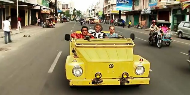 A scene from "The Act of Killing" is shown.