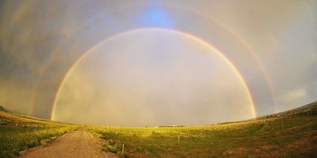 While on vacation on July 18, Texas native Jonathan Boening took this photograph of a double rainbow on a drive to Yellowstone National Park.