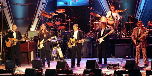 The Eagles perform at the band's induction into the Rock and Roll Hall of Fame on Jan. 13, 1998. Band members are (L-R) Randy Meisner, Timothy B. Schmidt, Glen Frey, Don Felder, Joe Walsh and Don Henley (rear). 