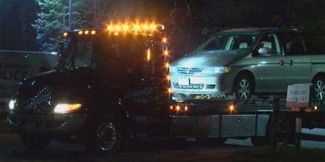 Kyle Plush told a 911 dispatcher that he was trapped inside a 2004 Honda Odyssey.
