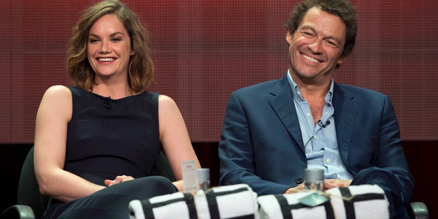 Cast members Ruth Wilson and Dominic West smile at a panel for the Showtime television series "The Affair" during the Television Critics Association Cable Summer Press Tour in Beverly Hills, California July 18, 2014. REUTERS/Mario Anzuoni