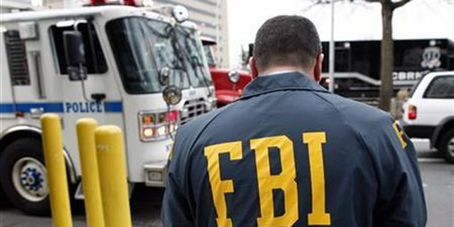 The FBI has seized almost 50 computers of suspects involved in a scheme that scammed a million victims.