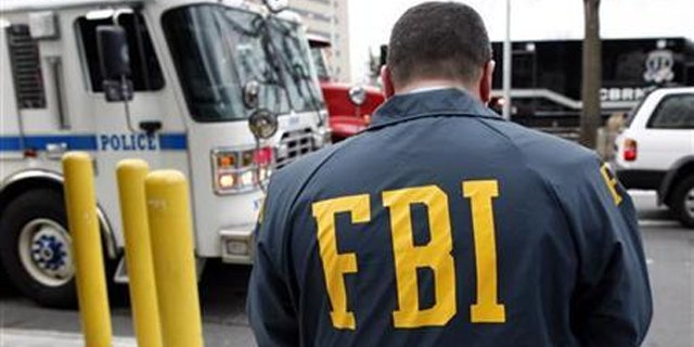 The FBI has seized almost 50 computers of suspects involved in a scheme that scammed a million victims.