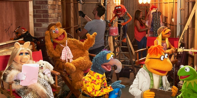Sept. 22, 2015: In this image released by ABC, muppet characters, from left, Miss Piggy, Pepe The King Prawn, Fozzie Bear, Gonzo, Animal, background center, Scooter, Janice, Kermit the Frog and Floyd Pepper appear in a scene from "The Muppets."