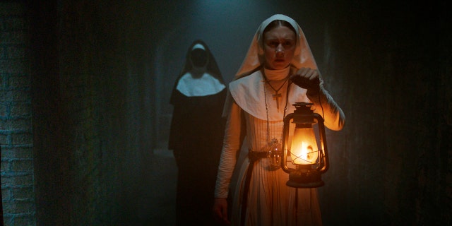 This image released by Warner Bros. Pictures shows Taissa Farmiga in a scene from "The Nun." (Warner Bros. Pictures via AP)