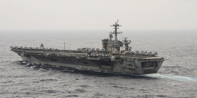 The aircraft carrier USS Theodore Roosevelt (CVN 71) transits the South China Sea in this U.S. Navy picture taken Oct. 29, 2015. (REUTERS/U.S. Navy/Mass Communications Specialist 3rd Class Anthony N. Hilkowski/Handout via Reuters)
