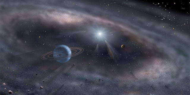 Planets form around a young star in this artist's concept.