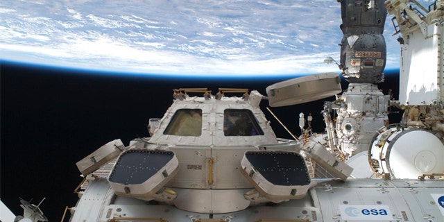 The astronauts making NASA's last shuttle flight turned into moving men and garbage haulers Wednesday July 13, 2011 with no time to dwell on their place in space history, after enjoying a special salute from the original "Rocket Man," Elton John.