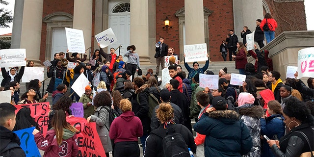 April 18, 2018: Syracuse University students gather outside Hendricks Chapel to protest a video made by members of a now-suspended fraternity.