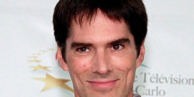 Actor Thomas Gibson who stars in the television series 'Criminal Minds' poses during a photocall at the 51st Monte Carlo television festival in Monaco June 8, 2011. REUTERS/Eric Gaillard/File Photo - RTX2KF68
