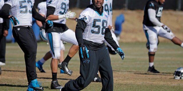 File photo - Carolina Panthers' Thomas Davis stretches during NFL football practice, Friday, Jan. 29, 2016, in Charlotte, N.C. (AP Photo/Chuck Burton)