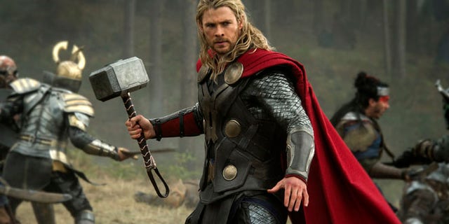 This publicity file photo released by Walt Disney Studios and Marvel shows Chris Hemsworth in a scene from "Thor: The Dark World." Thor: The Dark World continued its box-office reign with $38.5 million in its second week, holding off The Best Man Holiday, according to studio estimates Sunday, Nov. 17, 2013.