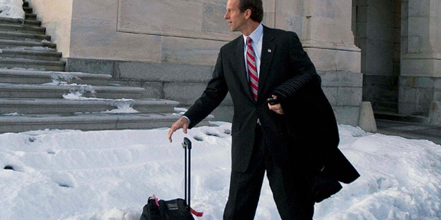 Thursday: Sen. John Thune, R-S.D., prepares to depart Washington for a winter recess, but Republicans have vowed to gin up opposition to the Senate health insurance overhaul during Congress' winter break. (AP Photo)