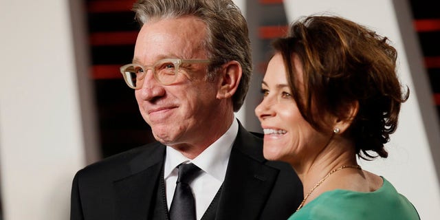 Actor Tim Allen and his wife Jane Hajduk arrive at the Vanity Fair Oscar Party in Beverly Hills, California February 28, 2016. REUTERS/Danny Moloshok - RTS8IGS