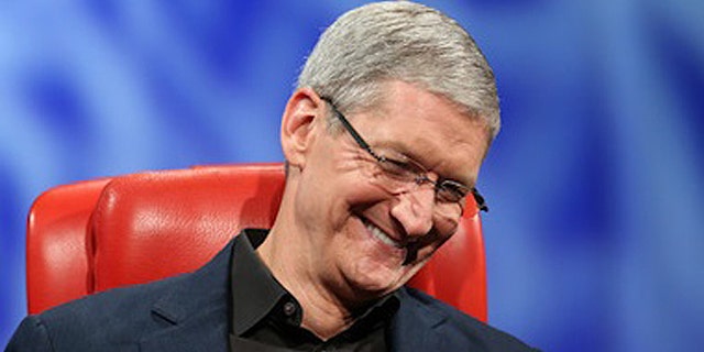 May 28, 2013: Apple CEO Tim Cook laughs on stage at the r 11th D: All Things Digital technology conference in Rancho Palos Verdes, Calif.