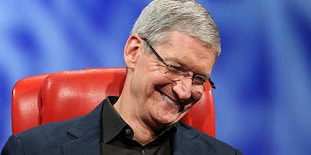 May 28, 2013: Apple CEO Tim Cook laughs on stage at the r 11th D: All Things Digital technology conference in Rancho Palos Verdes, Calif.