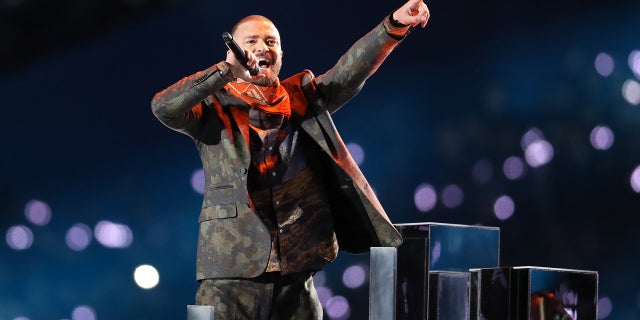 Pop star Justin Timberlake stopped his concert at Detroit’s Little Caesars Arena Monday to help a fan make a special announcement -- there's a baby on the way.