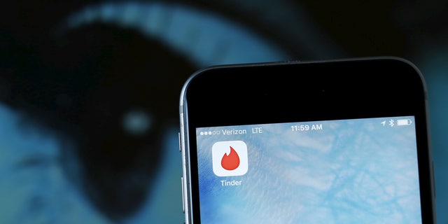 The dating app Tinder is shown on an Apple iPhone in this photo illustration taken February 10, 2016. (REUTERS/Mike Blake/Illustration)