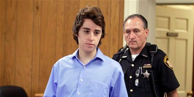 June 8, 2012: T.J. Lane is brought in to court for his arraignment by sheriff's deputies in Chardon, Ohio.