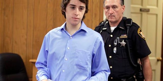 June 8, 2012: T.J. Lane is brought in to court for his arraignment by sheriff's deputies in Chardon, Ohio.