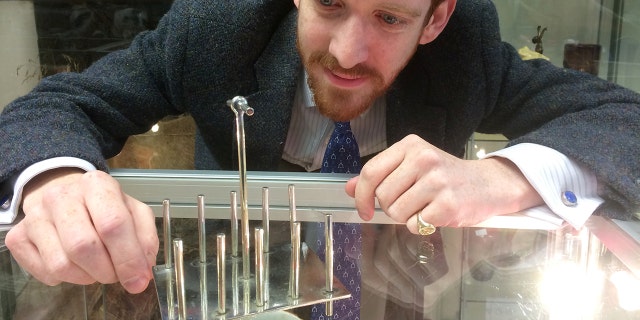 An appraiser has said he's seen a similar toast rack go for about $16,000 at auction.