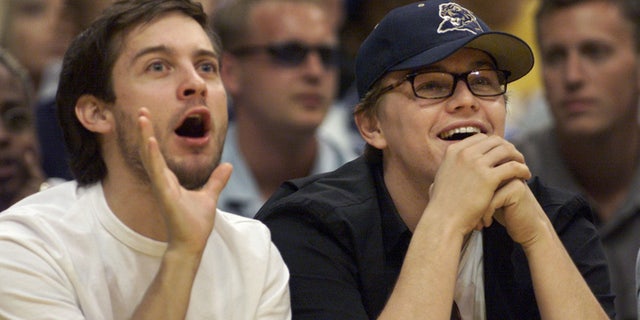 Actors Tobey Maguire (L) and Leonardo DiCaprio take in Game 1 of the NBA Western Conference finals between the Los Angeles Lakers and the Portland Trail Blazers May 20 in Los Angeles. The two actors sat courtside for the game and watched Los Angeles defeat Portland 109-94.
MB/SV - RTRUPU7