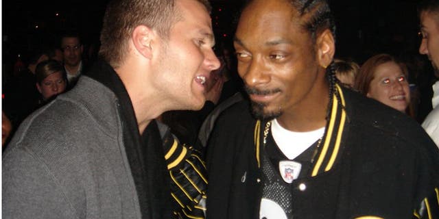 Tom Brady and Snoop Dogg (Photo by Lori Levine/Getty Images)