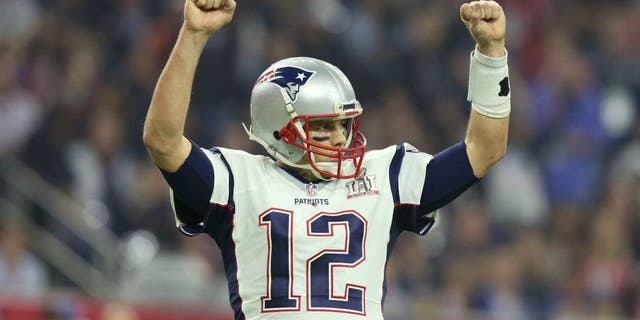 New England Patriots QB Tom Brady #12 celebrates a touchdown against the Atlanta Falcons at Super Bowl 51 on Sunday, February 5, 2017 in Houston, TX. (AP Photo/Gregory Payan)