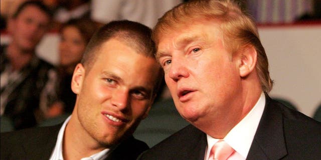 New England Patriots quarterback Tom Brady chats with Donald Trump (Photo by Donna Connor/WireImage)