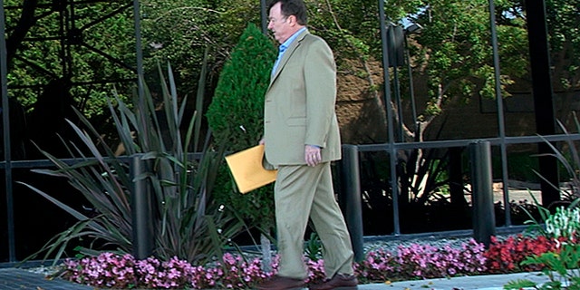 Tom Colbert walking into FBI Ventura County Office Friday with potential new evidence in the D.B. Cooper case,
