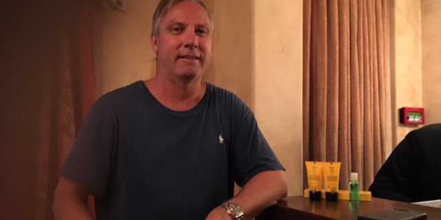 Tom Schlueter told Fox News the water in his neighborhood was up to his chin.