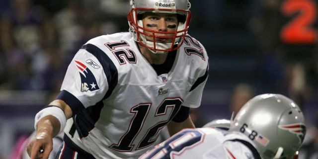 FILE 2006: New England Patriots quarterback Tom Brady calls an audible.