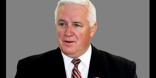 Pennsylvania Attorney General Tom Corbett, left, and New Jersey Gov. Chris Christie, speak at a rally to support Corbett's bid for governor of Pennsylvania in Williamsport, Pa. on Monday, Oct. 11, 2010. (AP Photo/Ralph Wilson)