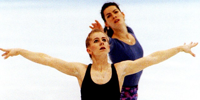 USA figure skaters Tonya Harding (L) and Nancy Kerrigan practice their technical programmes together during a practice session at Hamar's Olympic Amphitheatre on February 22 - RTXFH8S