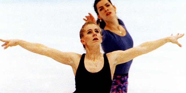 USA figure skaters Tonya Harding (L) and Nancy Kerrigan practice their technical programmes together during a practice session at Hamar's Olympic Amphitheatre on February 22 - RTXFH8S