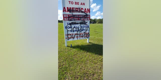 Simmons' sign was vandalized with a vulgar quote by President Trump after she posted about it on Facebook.