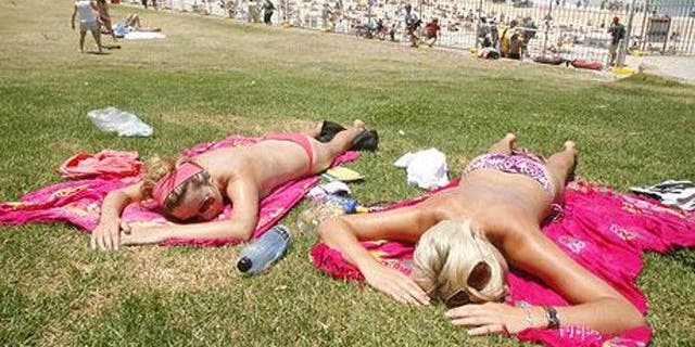 Sunbathers on Bondi Beach in Australia.