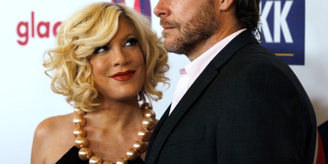 April 10, 2011. Tori Spelling and husband Dean McDermott arrive at the 22nd annual Gay and Lesbian Alliance Against Defamation (GLAAD) Media Awards in Los Angeles, California.
