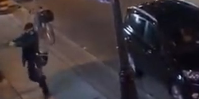 The gunman can be seen firing into a restaurant in Toronto's Greektown neighborhood.