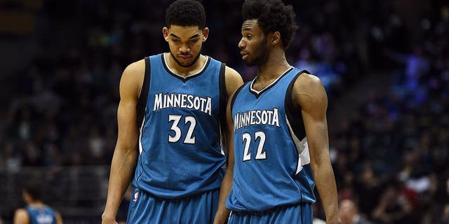 MILWAUKEE, WI - MARCH 11: Karl-Anthony Towns #32 and Andrew Wiggins #22 of the Minnesota Timberwolves walks backcourt during a game against the Milwaukee Bucks at the BMO Harris Bradley Center on March 11, 2017 in Milwaukee, Wisconsin. NOTE TO USER: User expressly acknowledges and agrees that, by downloading and or using this photograph, User is consenting to the terms and conditions of the Getty Images License Agreement. (Photo by Stacy Revere/Getty Images)