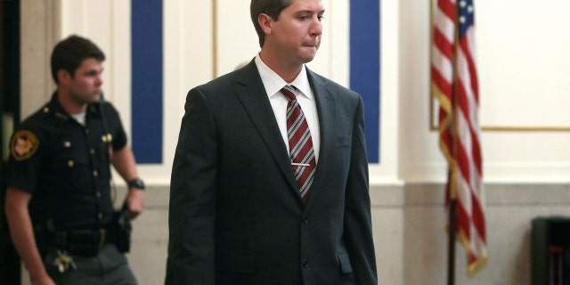 Ray Tensing enters Judge Megan Shanahan's courtroom for his pre-trial hearing on Friday, Oct. 14, 2016, in Cincinnati.