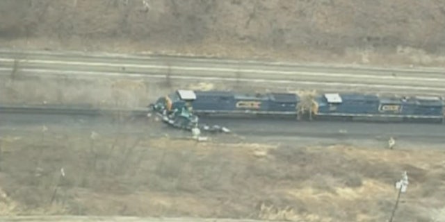 Evacuations were ordered in a Pennsylvania neighborhood after a train collided with a truck carrying hydrochloric acid.