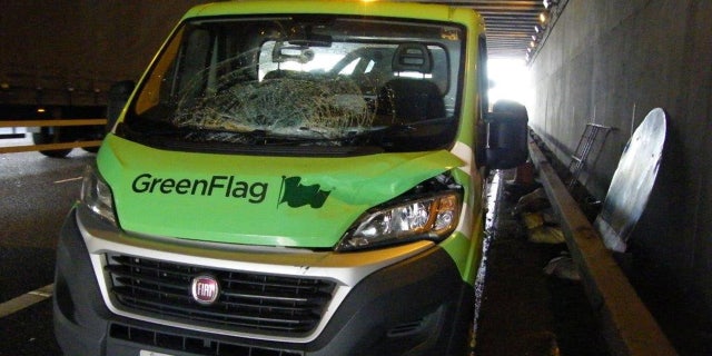 This is what happened when a car transporter collided with a motorway bridge - and accidentally turned a brand new Range Rover into a convertible. See SWNS story SWOOPS; The driver forgot to lower the top deck before travelling along the M61, police said. Fortunately nobody was hurt, but the brand new red car lost its windscreen and windows. But photos show the rest of the car - including the seats, steering wheel and door - remained intact, following the crash near Farnworth, Greater Manchester.