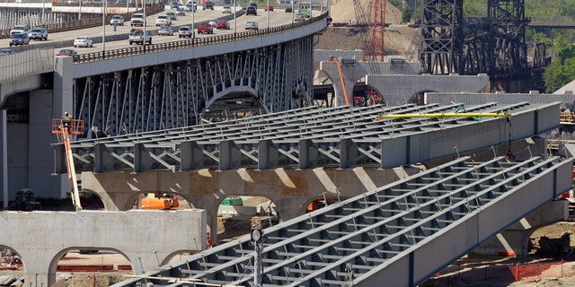 May 17, 2012: The steel skeleton for the eastern end of the new Innerbelt Bridge in Cleveland sits next to the existing span.