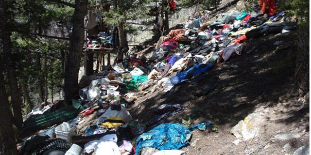 Trash pile in Colorado's Uncompahgre National Forest. (US Attorney's Office)