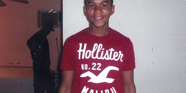 In this undated file family photo, Trayvon Martin poses for a family photo.