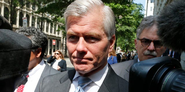 May 12, 2015: Former Virginia Gov. Bob McDonnell navigates a group of cameras as he leaves the 4th U.S. Circuit Court of Appeals after a hearing the appeal of his corruption conviction in Richmond, Va. (AP)